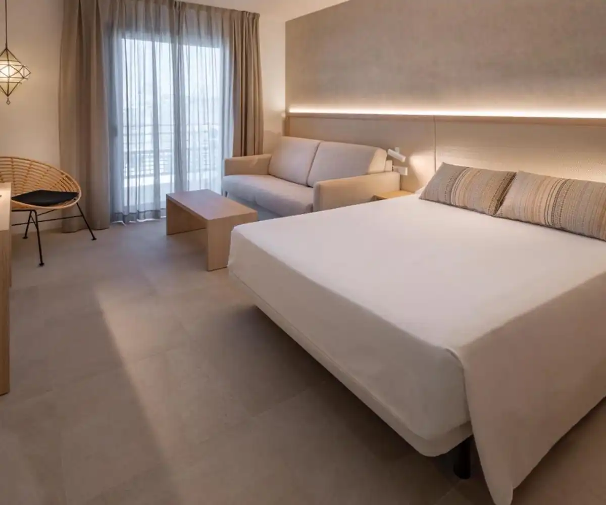 cama habitacion con ventana